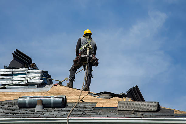 Professional Storm Damage Roof Repair technician working in Little Falls, NJ